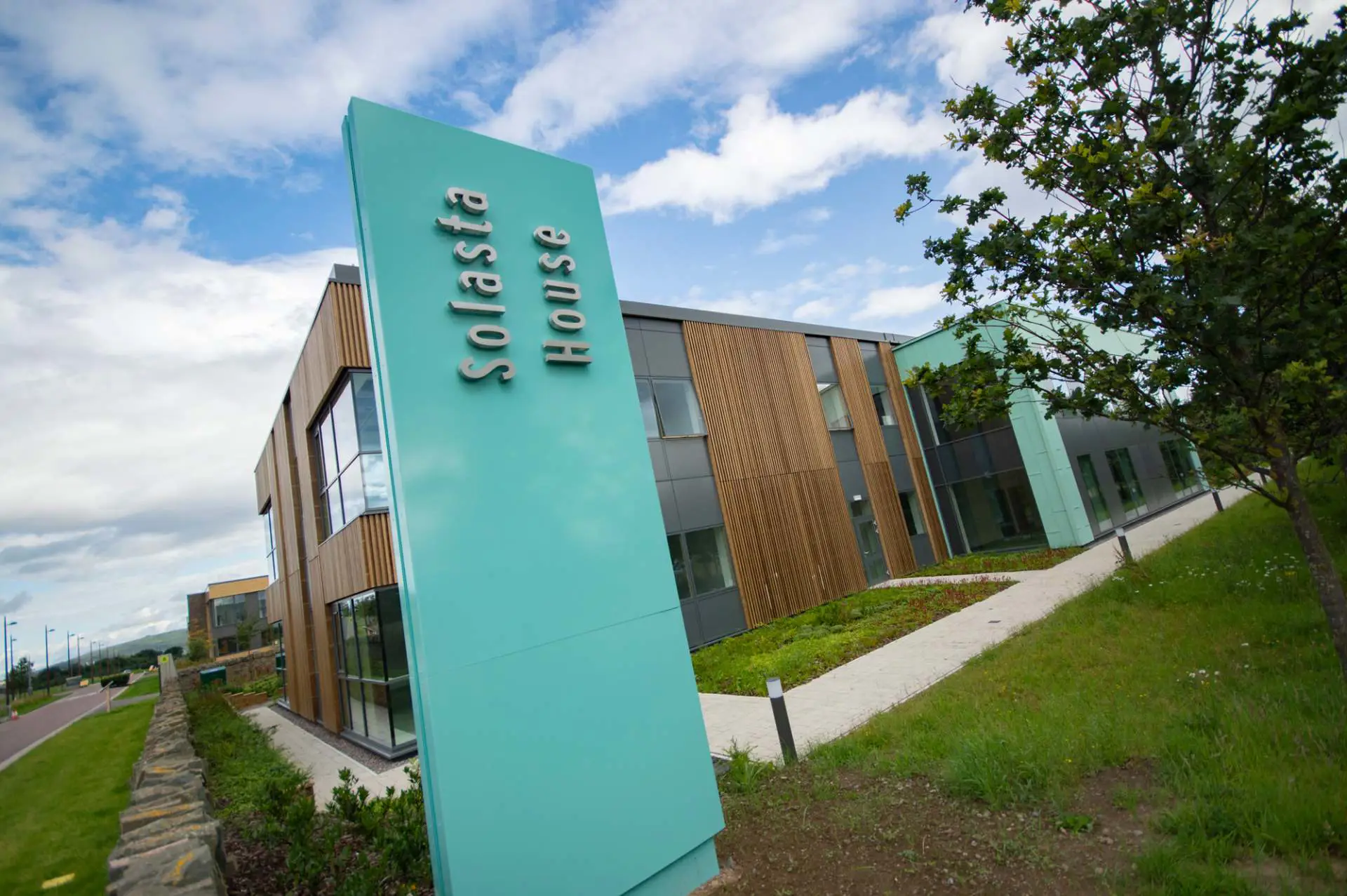 Signpost outside Solasta house building on Inverness Campus